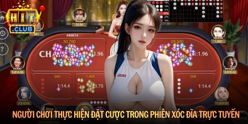 Người chơi thực hiện đặt cược trong phiên xóc đĩa trực tuyến